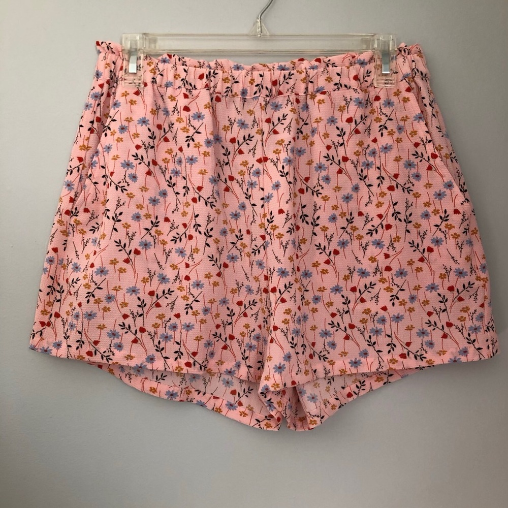 pink flowy floral shorts with pockets